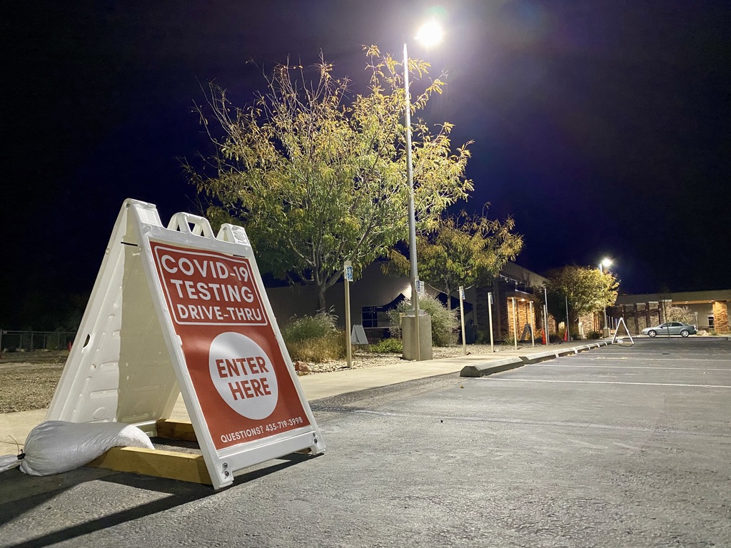 An "Enter Here" sign for the COVID-19 drive-thru testing at Moab Regional Hospital