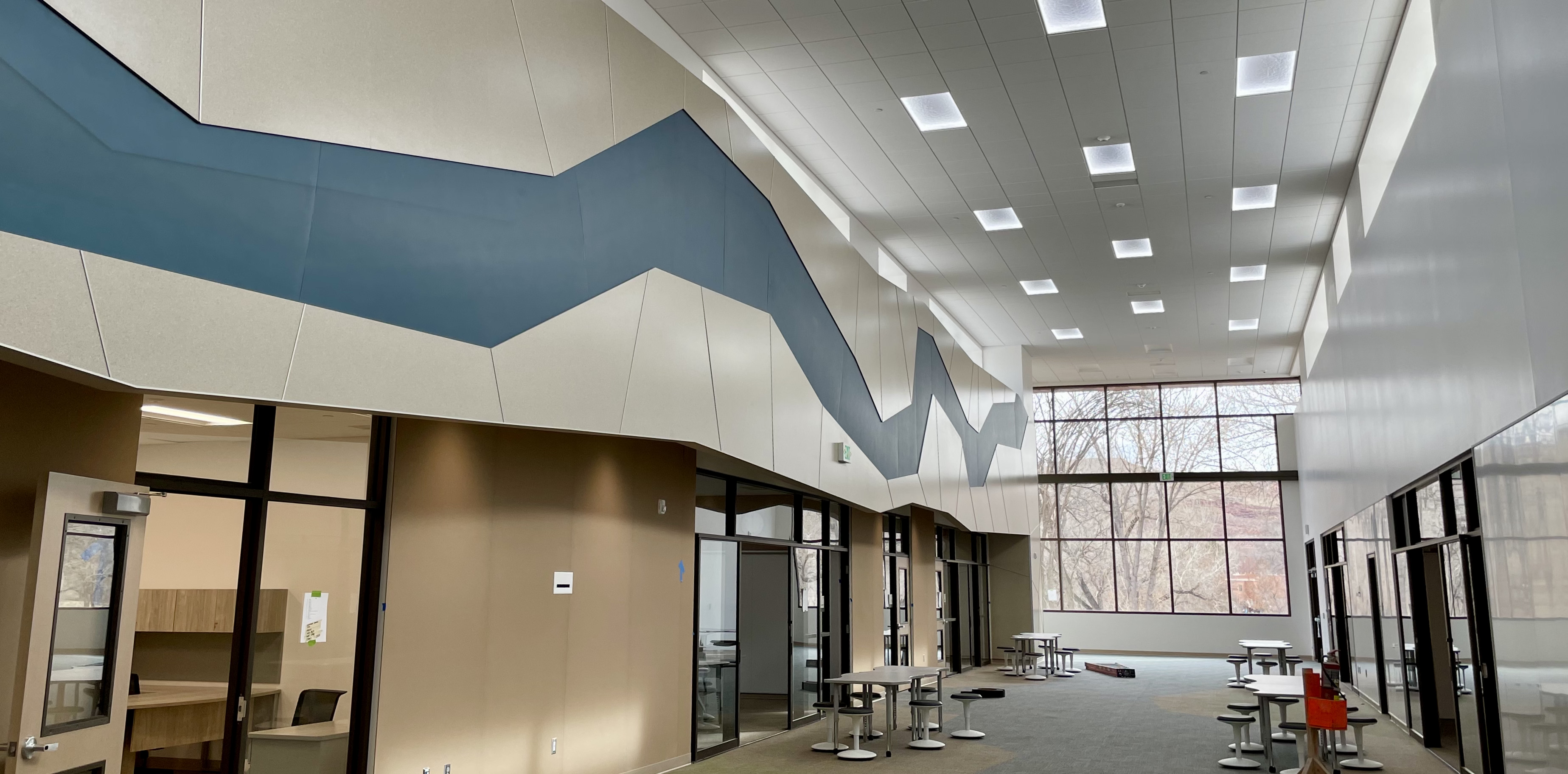The eight grade wing of the new middle school is the tallest of the three classroom wings and features an element inspired by the Colorado River above the classrooms. 