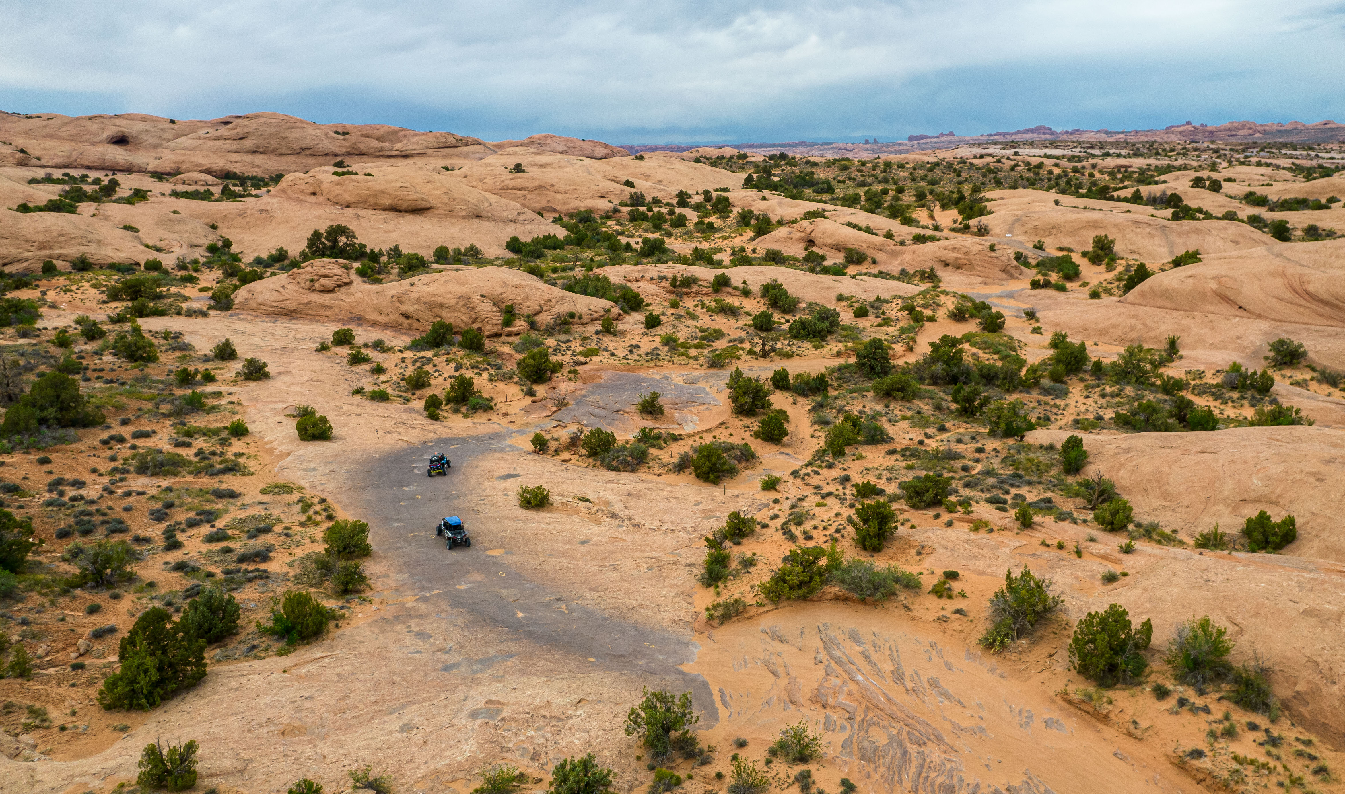 Off-highway vehicles drive along Hell's Revenge, a 4x4 trail in Sand Flats Recreation Area near Moab, Utah.