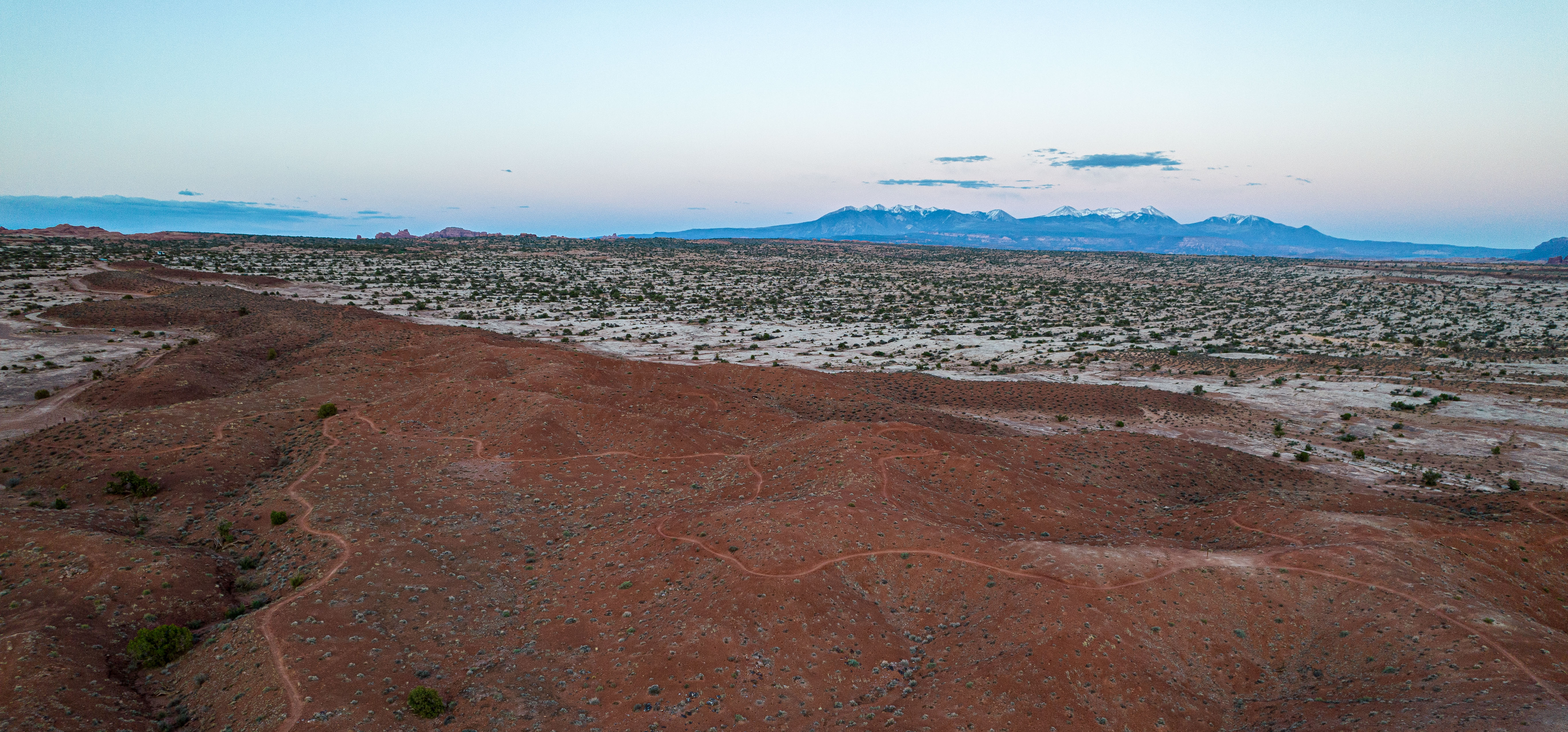 Aerial photo of the southern portion of the Klonzo trail network with the La Sal Mountains in the background