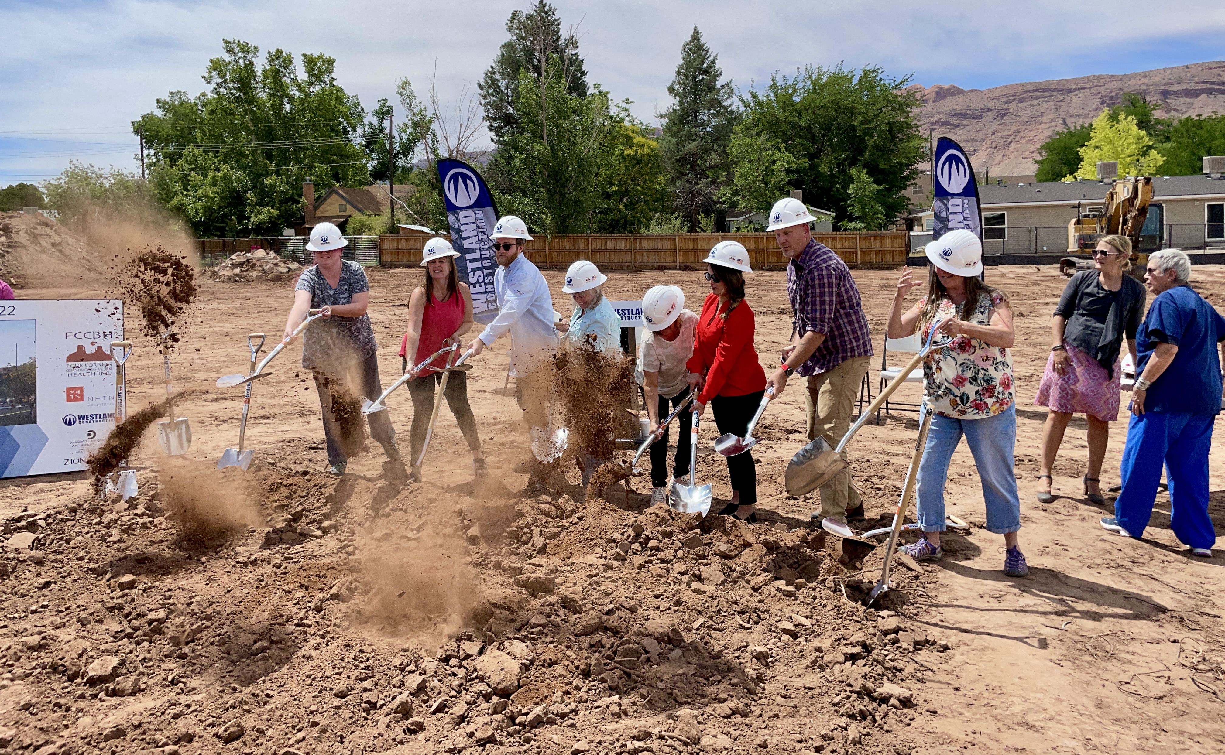 Clients of and clinicians for Four Corners also showed up and had their own go at the groundbreaking task. 